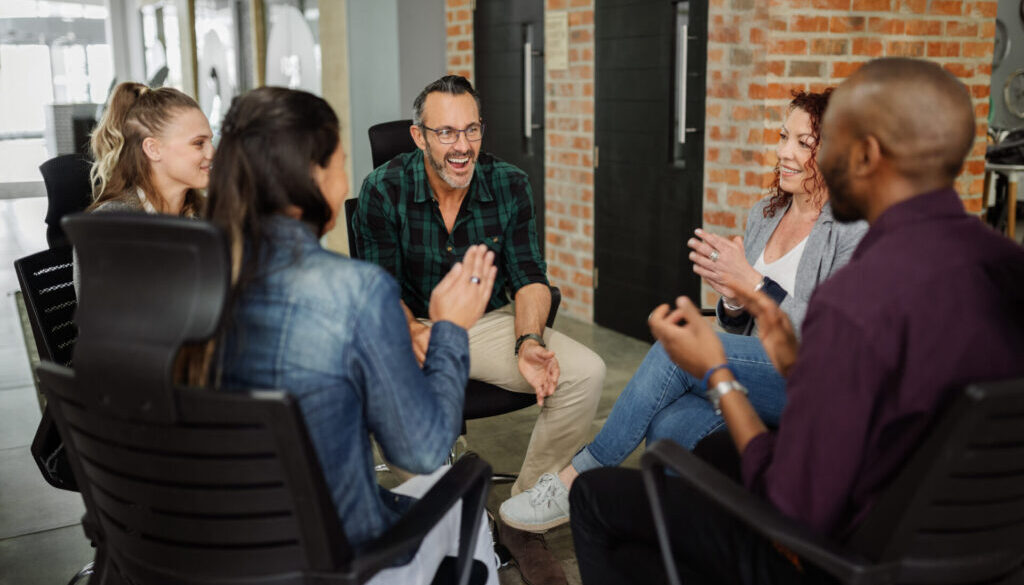 diverse group of people engaged in conversation and networking