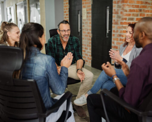 diverse group of people engaged in conversation and networking