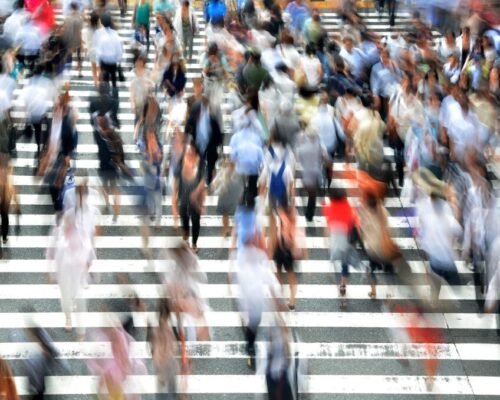 Blurred photo of people walking - potential weak ties